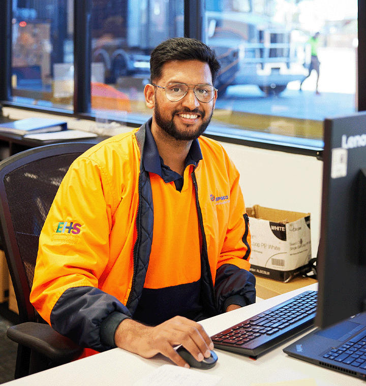 Employee sitting at a computer