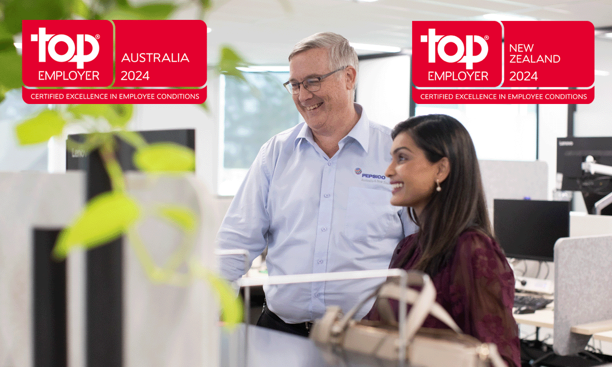 Australia Top employer and New Zealand Top employer logos on top of photo of employees in the office