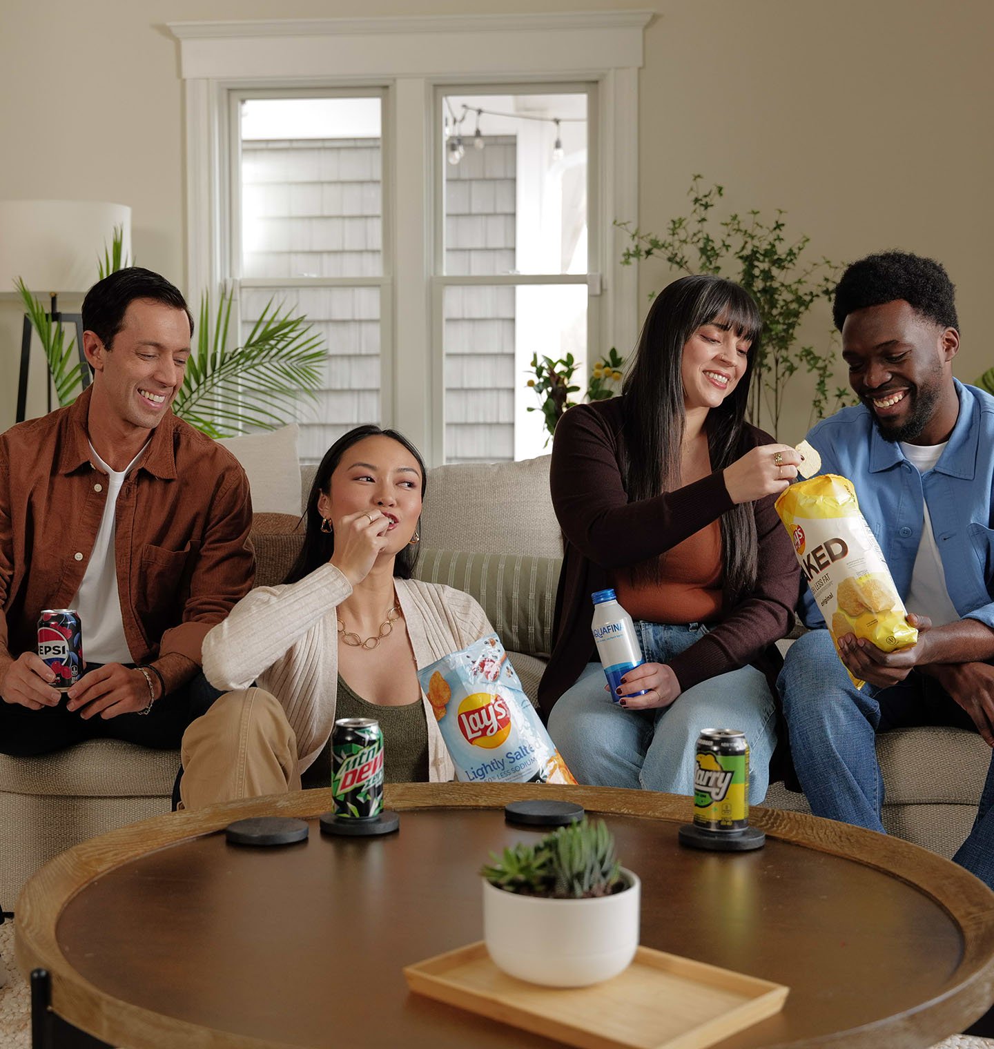 Friends enjoying a variety of PepsiCo products