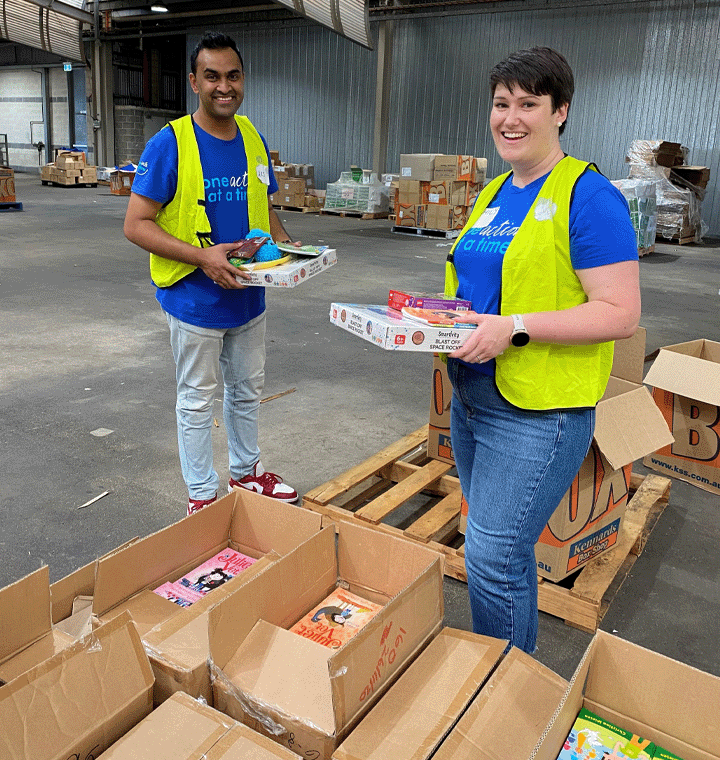 Employees volunteering at a One Smile at a Time event